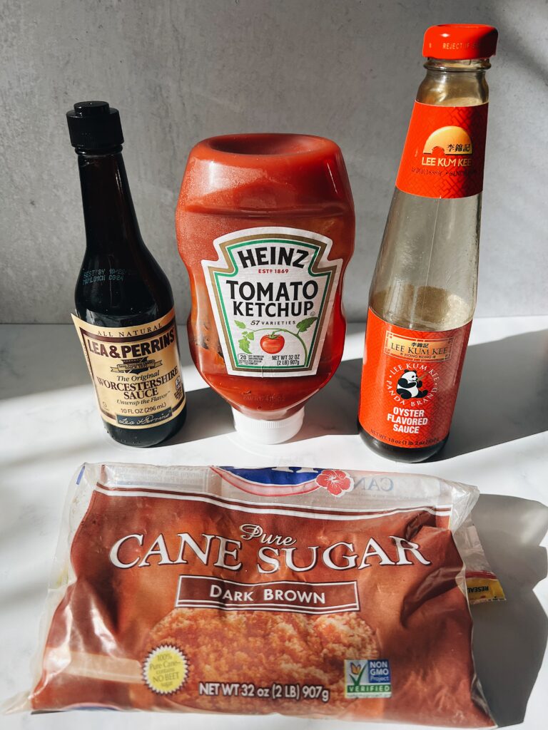 worcestershire sauce, ketchup, oyster sauce, and brown sugar lined up